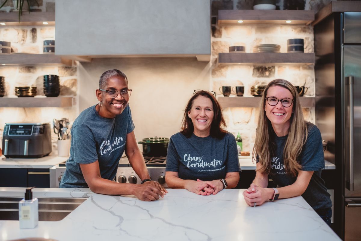 Lifestyle Management Co. Columbus team members at kitchen island